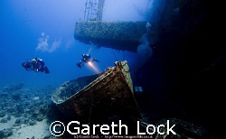 Lifeboats lying along side the Salem Express wreck in the... by Gareth Lock 